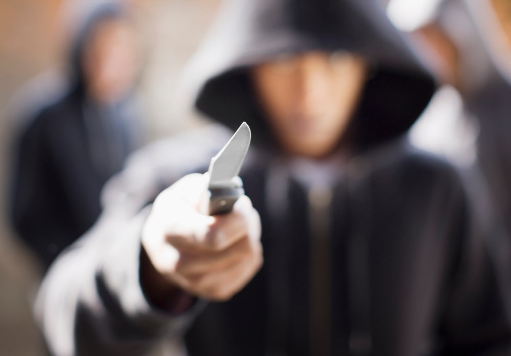 man-threatening-with-pocket-knife