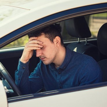 young-guy-drunk-in-car