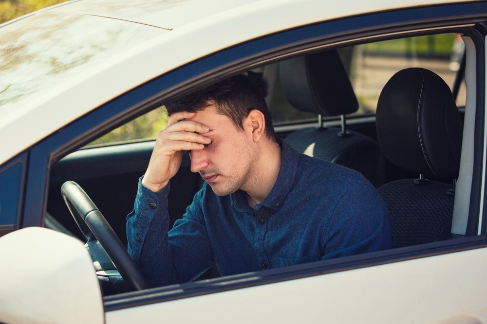 young-guy-drunk-in-car