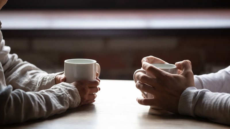 man-woman-close-up-negotiating