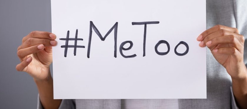 woman-holding-metoo-hashtag