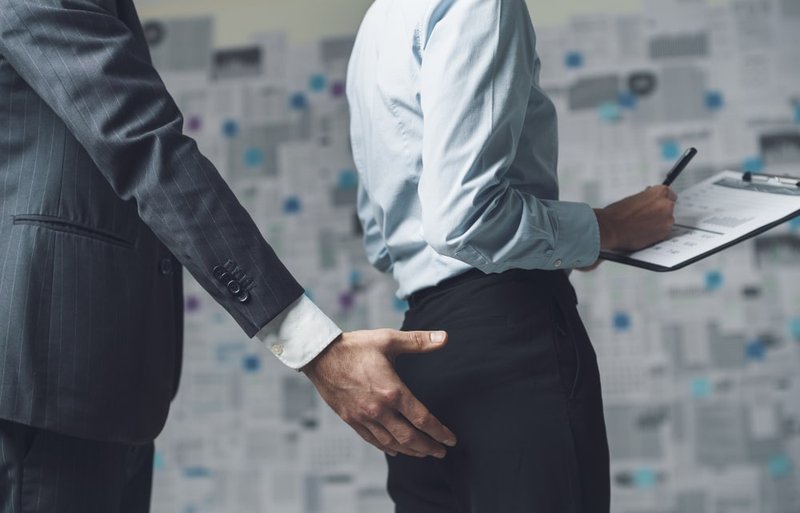 woman-sexual-harassment-in-office
