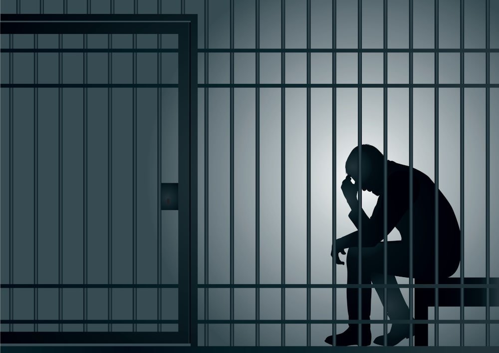 man-imprisoned-in-cell
