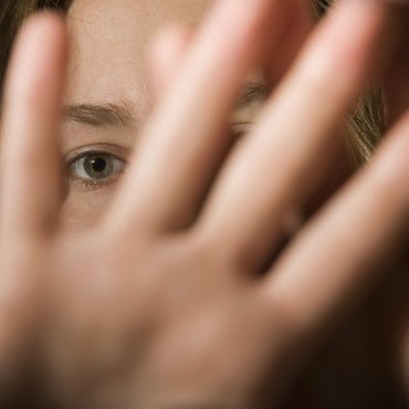 woman-showing-stay-away