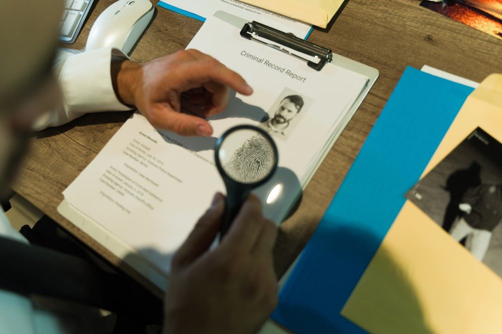 investigator-checking-criminal-record