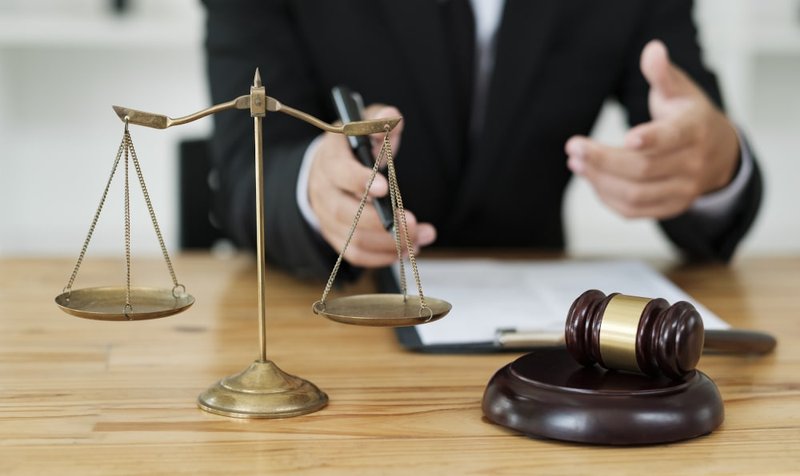 Lawyer consulting a client about Canada’s age of consent law and related criminal charges