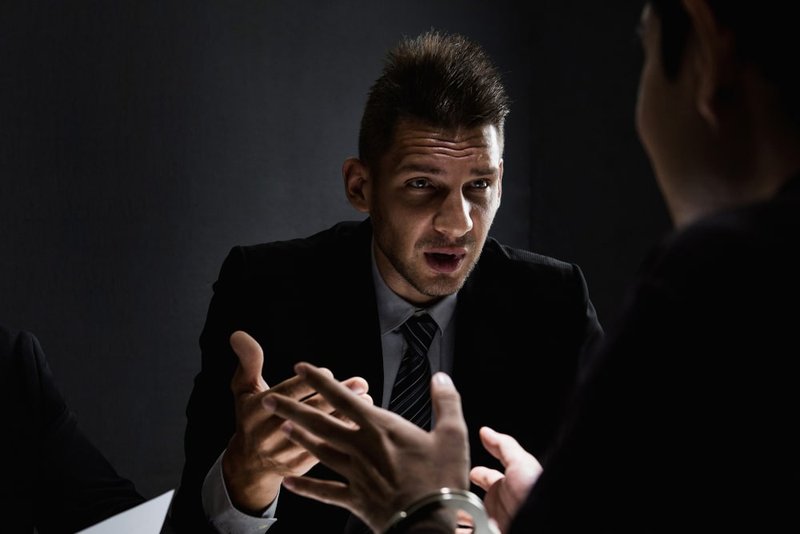 Criminal being questioned during cross-examination in a Canadian courtroom