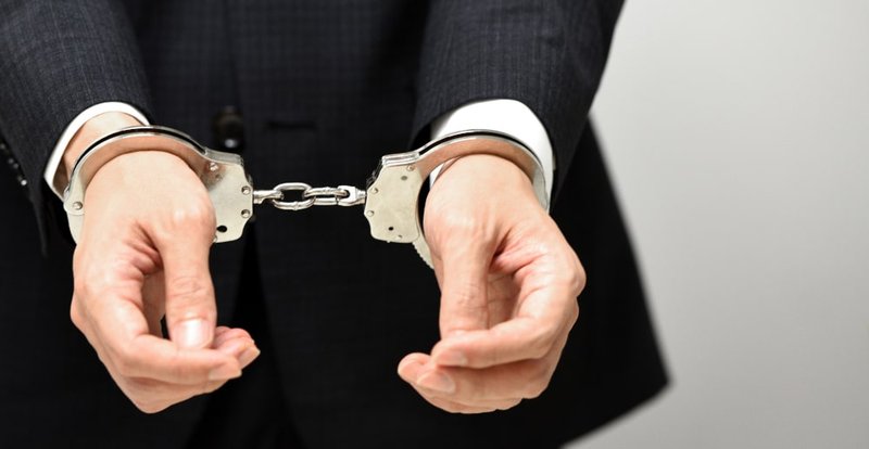 Hands in handcuffs symbolize legal consequences and defence strategies in Canadian sexual offence cases.