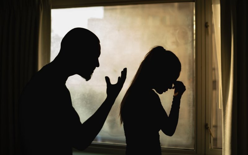 Husband yelling at wife in a domestic assault scenario