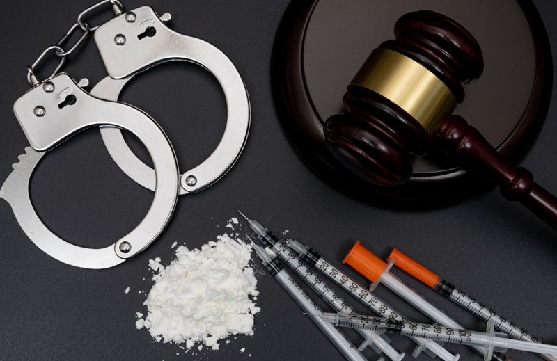 White powder and drug evidence were displayed during a drug trafficking investigation in Canada