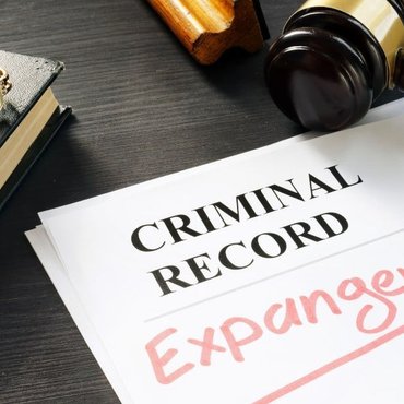 Illustration representing expungement and sealing of criminal records in Canada, showing how convictions affect long-term legal and personal consequences.