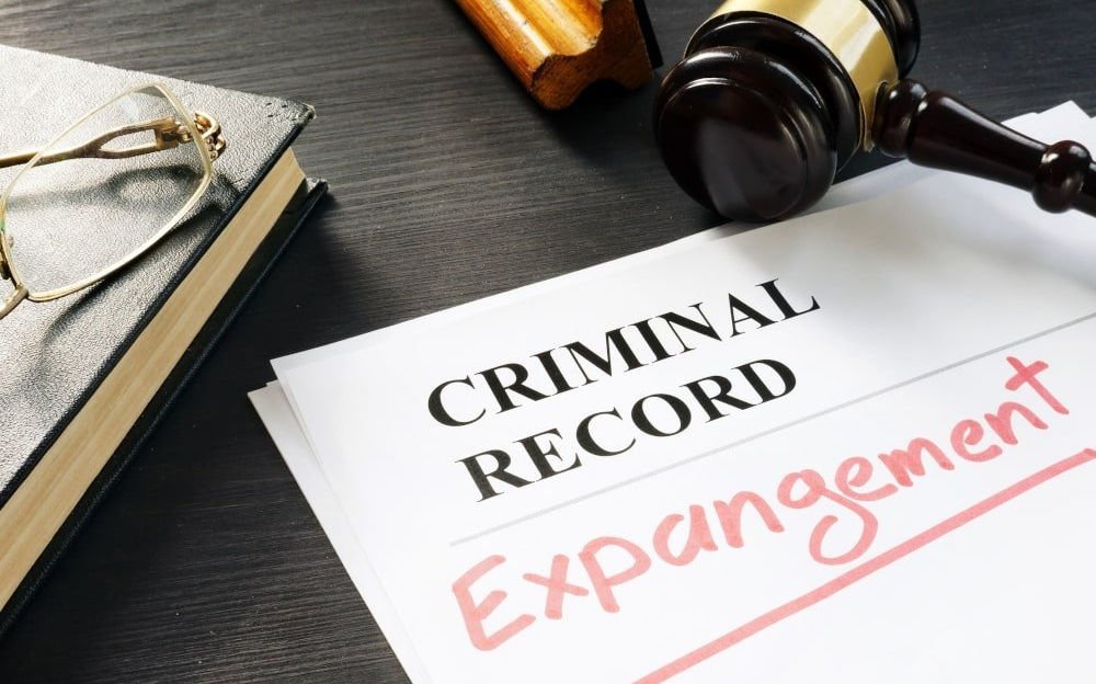 Illustration representing expungement and sealing of criminal records in Canada, showing how convictions affect long-term legal and personal consequences.
