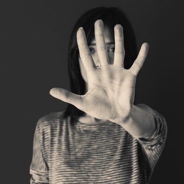 woman-making-stop-gesture-with-her-hand