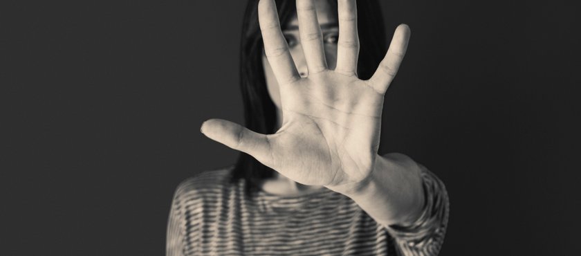woman-making-stop-gesture-with-her-hand