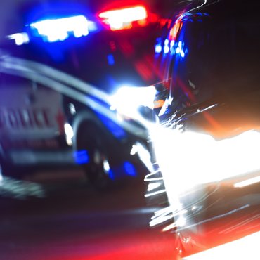 blurred-police-car-because-of-DUI