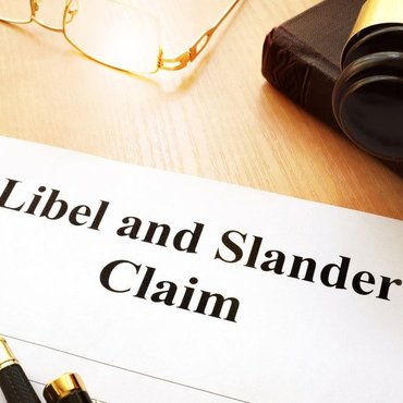 Visual illustrating the distinction between civil defamation and criminal defamatory libel under Canadian law, including potential penalties under the Criminal Code.