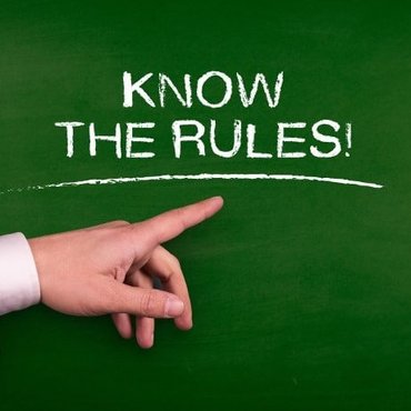 A driver holding the steering wheel during a police traffic stop for suspected impaired driving in Ontario