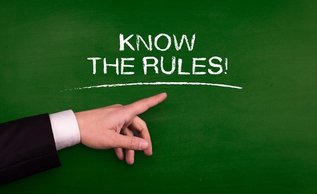 A driver holding the steering wheel during a police traffic stop for suspected impaired driving in Ontario