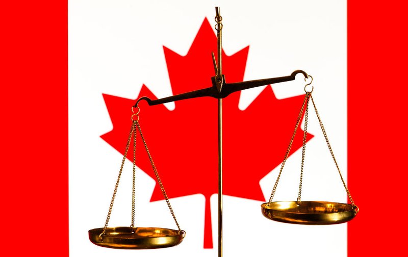 Scales of justice with Canadian imagery symbolizing the Review Board process under Part XX.1 of the Criminal Code, where the accused may receive an absolute discharge, conditional discharge, or detention based on public safety.
