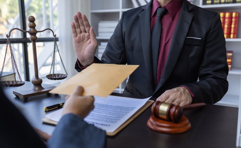 Criminal defence lawyer advising a client before providing a statement to police or the court in Canada.